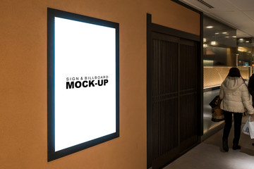 The mock up light box on the wall at corridor inside mall