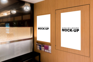 The mock up two billboards on the wall inside mall