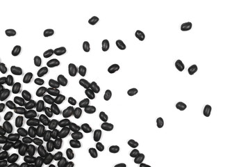 Pile organic black beans, isolated on white background, top view