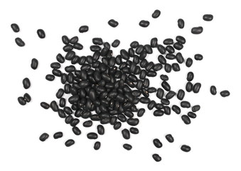 Pile organic black beans, isolated on white background, top view
