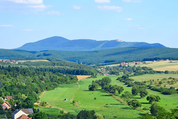 Fototapeta na wymiar View of a Hungarian village and mountains
