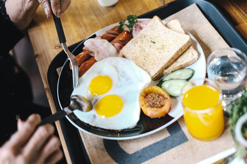 Having american breakfast set  with orange juice