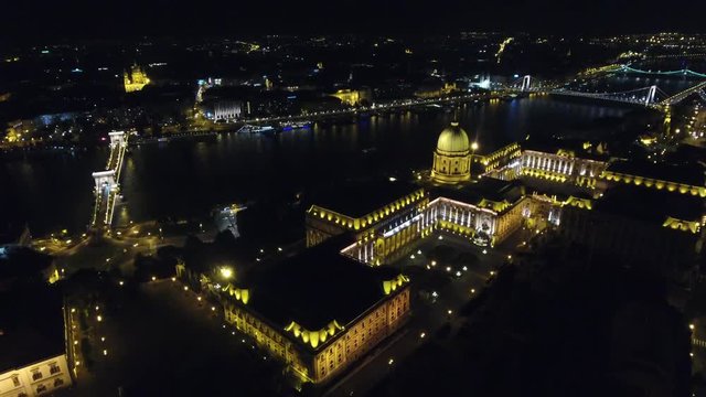 Hungarian Royal Palace, Chain bridge, Danube aerial view at night in Budapest, Hungary