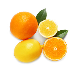 Composition with ripe lemons and oranges on white background