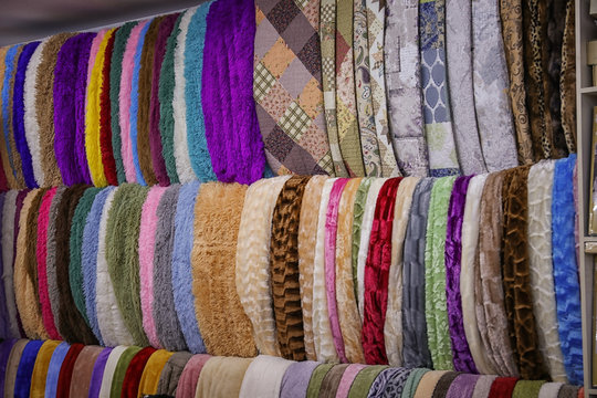 Assortment of soft blankets in store