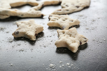Raw dough for cookies on dark background