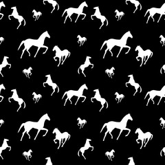 Naklejka premium Horses seamless pattern. Can be used for textile, website background, book cover, packaging.