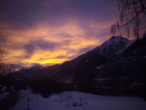 Mountain Panorama Red And Yellow Sky. Sunrise In Mountain