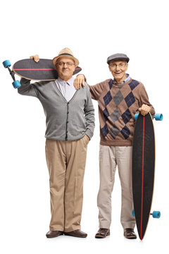 Two elderly men with longboards