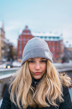 Sensual young woman in winter street