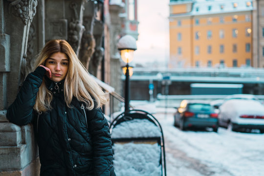 Bored woman on winter street