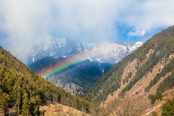 Rainbow in the Himalaya Mountains