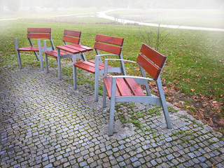Empty park banches and seats  in November