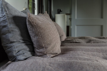 pillows on a bed in a cabin