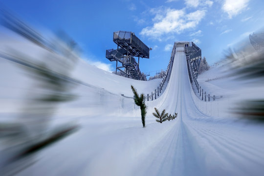 View from the take-off zone to the point of departure. Ski jumping hill Seefeld, Austria.