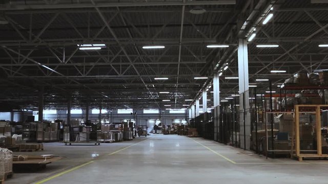 Slightly blurred industrial background. Typical storage, warehouse interior. Selective focus.	