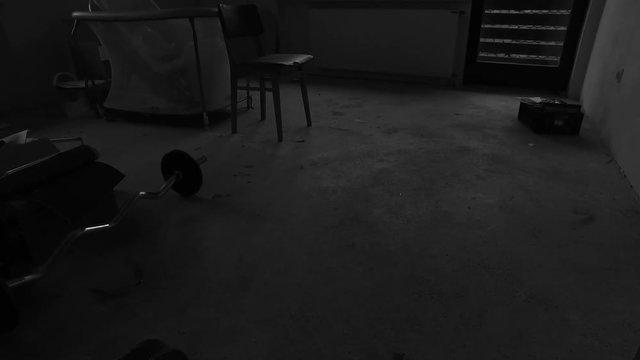 Opened doors into dark and abandoned room in the house. Not enough money to move into new flat. Abandoned home. Abandoned house.