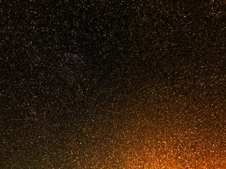 Fototapeta na wymiar Abstract bokeh background with galaxy feel. Image taken from frozen car window.