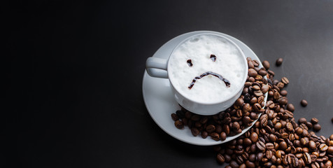 Scabies, Top view hot cappuccino and coffee beans on a black background.isolated on black with copy space