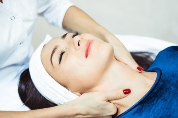 Obraz na płótnie Canvas face massage in Spa salon