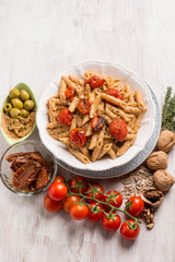 pasta with dried tomatoes green olives and sicilian pesto