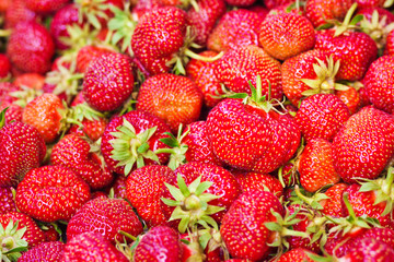 Ripe strawberries on the market. Sale of berries. Fruit and vegetable market
