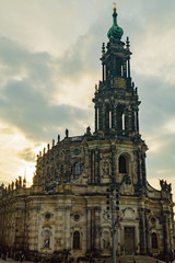 Fototapeta premium The Catholic court church of Dresden with a slightly cloudy sky and sunshine