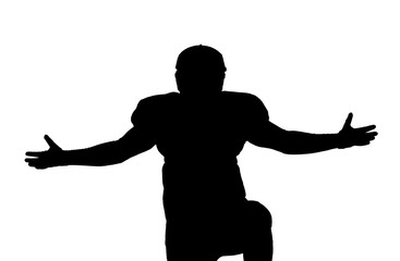 american football player celebrating after scoring a touchdown