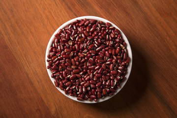 red beans on wooden background