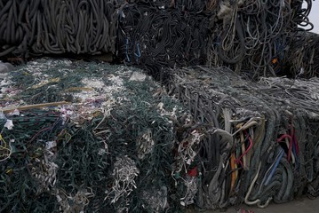 scrapyard recycling center creates beautiful manmade landscapes from waste metal using cranes with claws 