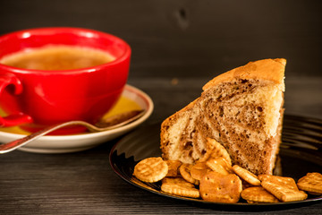 delicious cracker and fresh coffee on a wooden background 