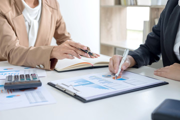 Co working conference, Business team meeting present, investor colleagues discussing new plan financial graph data on office table with laptop and digital tablet, Finance, accounting, investment