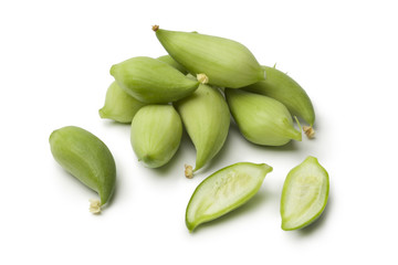 Whole and half green wild cucumbers