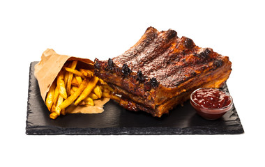 grilled ribs with fries and sauce
