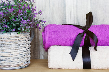 Towels with a decorative plant. Beauty Spa Health and Wellness concept.
