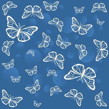 Silhouettes of white butterflies