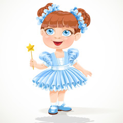 Little girl in a blue ballet tutu and magic wand