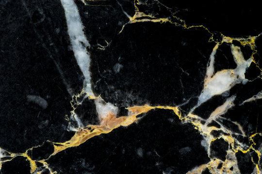 golden black marble pattern with abstract texture