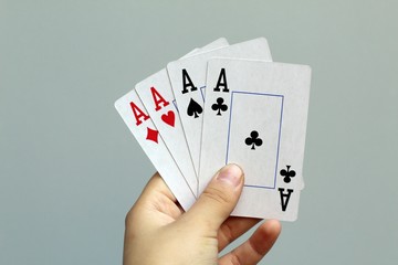 aces in hand - Powered by Adobe