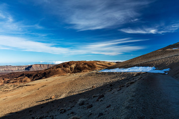 Teide National Park, Tenerife, Canary Islands - colourful soil of the Montana Blanca volcanic ascent trail. This scenic hiking path leads up to the 3718 m Teide Peak, the highest peak in Spain