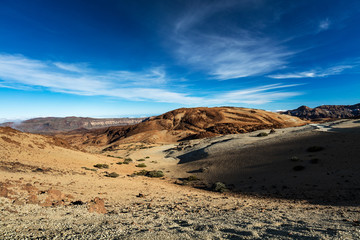 Teide National Park, Tenerife, Canary Islands - colourful soil of the Montana Blanca volcanic ascent trail. This scenic hiking path leads up to the 3718 m Teide Peak, the highest peak in Spain