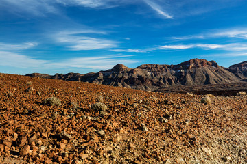 Teide National Park, Tenerife, Canary Islands - colourful soil of the Montana Blanca volcanic ascent trail. This scenic hiking path leads up to the 3718 m Teide Peak, the highest peak in Spain