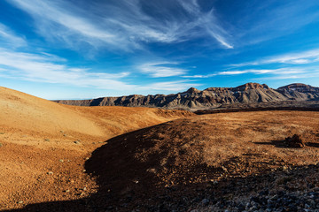 Teide National Park, Tenerife, Canary Islands - colourful soil of the Montana Blanca volcanic ascent trail. This scenic hiking path leads up to the 3718 m Teide Peak, the highest peak in Spain