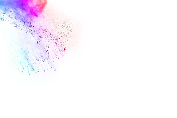 abstract multicolored powder splatted on white background,Freeze motion of color powder exploding.