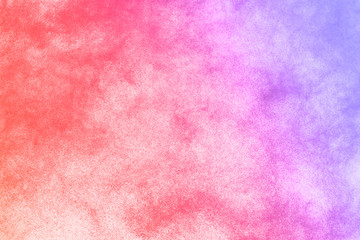 abstract multicolored powder splatted on white background,Freeze motion of color powder exploding.