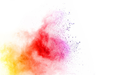 abstract multicolored powder splatted on white background,Freeze motion of color powder exploding.