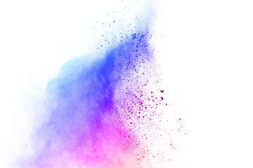 abstract multicolored powder splatted on white background,Freeze motion of color powder exploding.