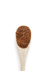 Ground red chili pepper paprika spice in wooden spoon isolated o