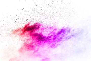 abstract multicolored powder splatted on white background,Freeze motion of color powder exploding.