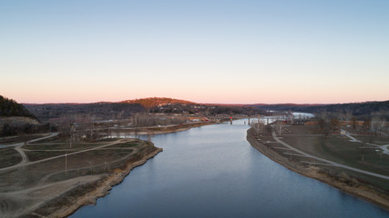 Aerial view of Bull Shoals lake and bridge being built.